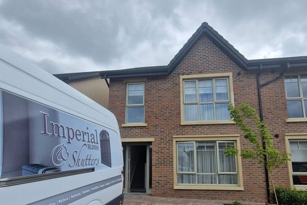 The Imperial Blinds and Shutters van parked outside a house on the day of a fitting